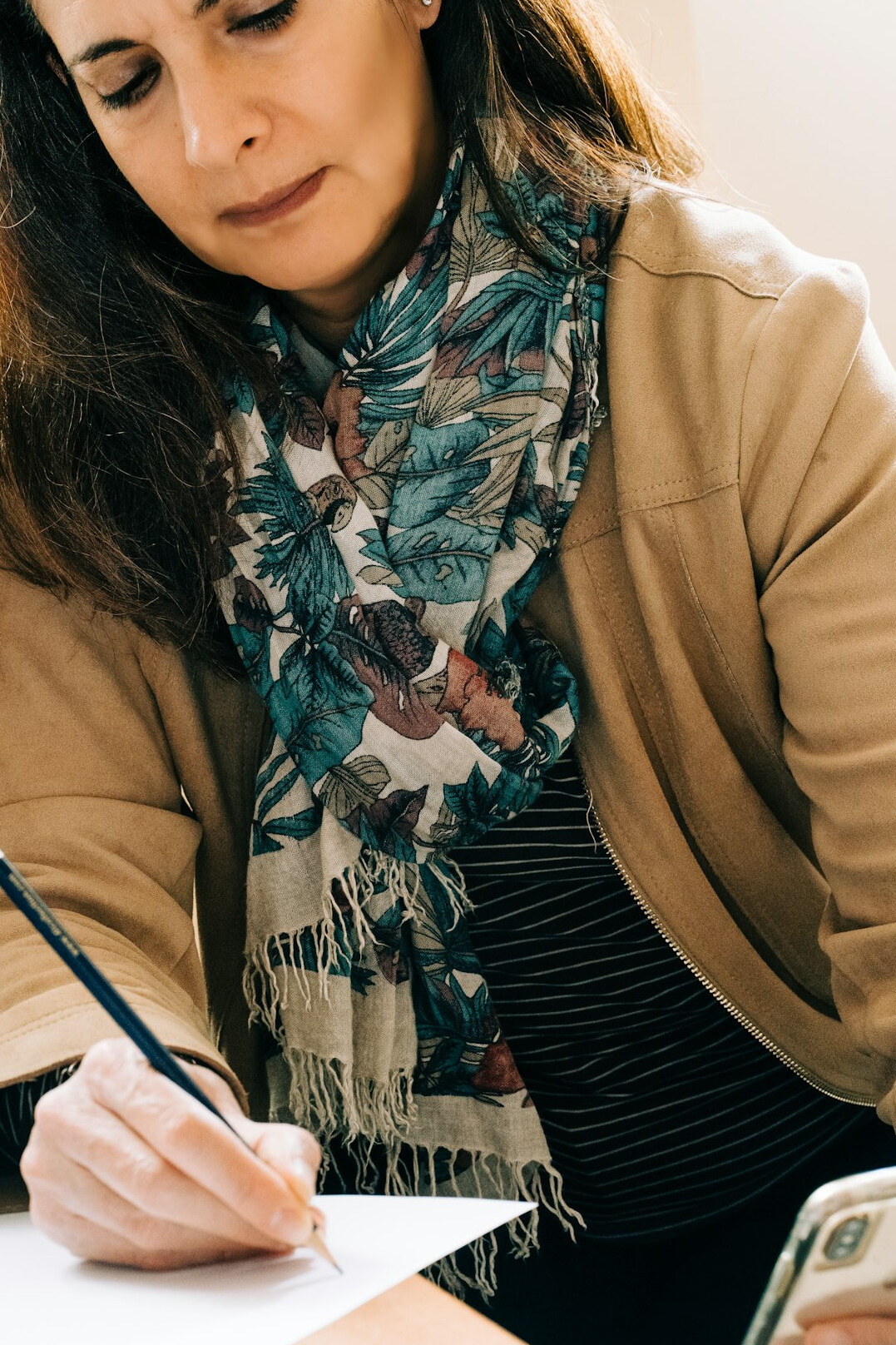 woman reviewing monthly expenses
