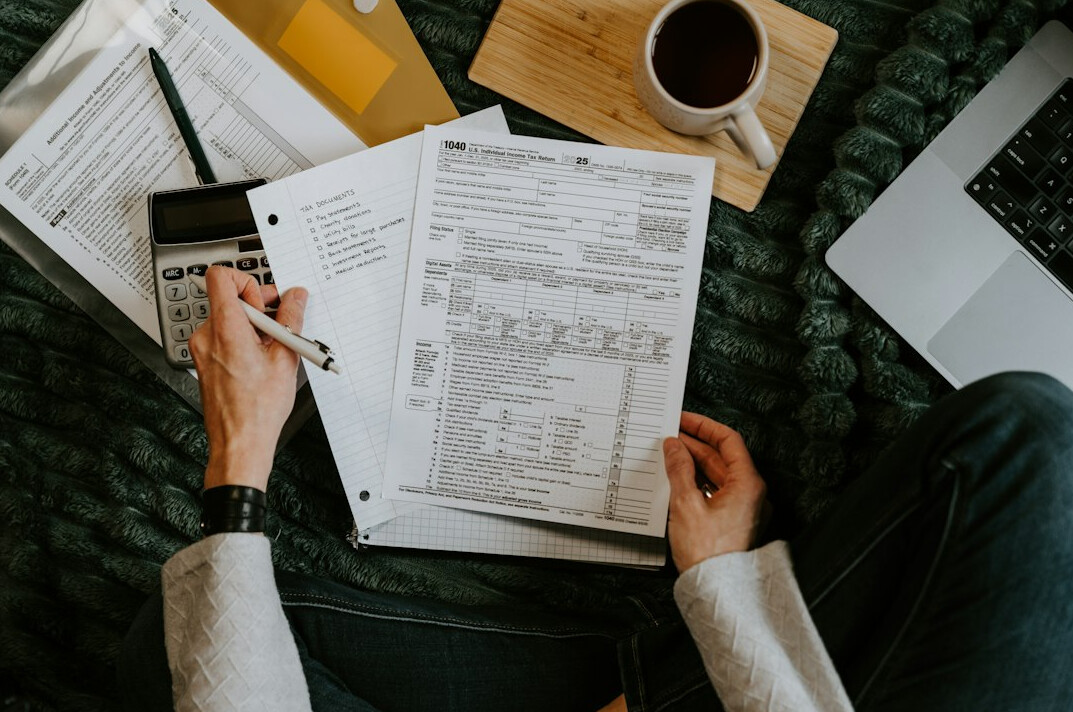 person reviewing monthly budget
